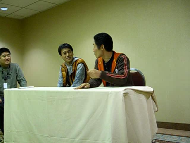 L to R: translator, Umehara, Tanaka